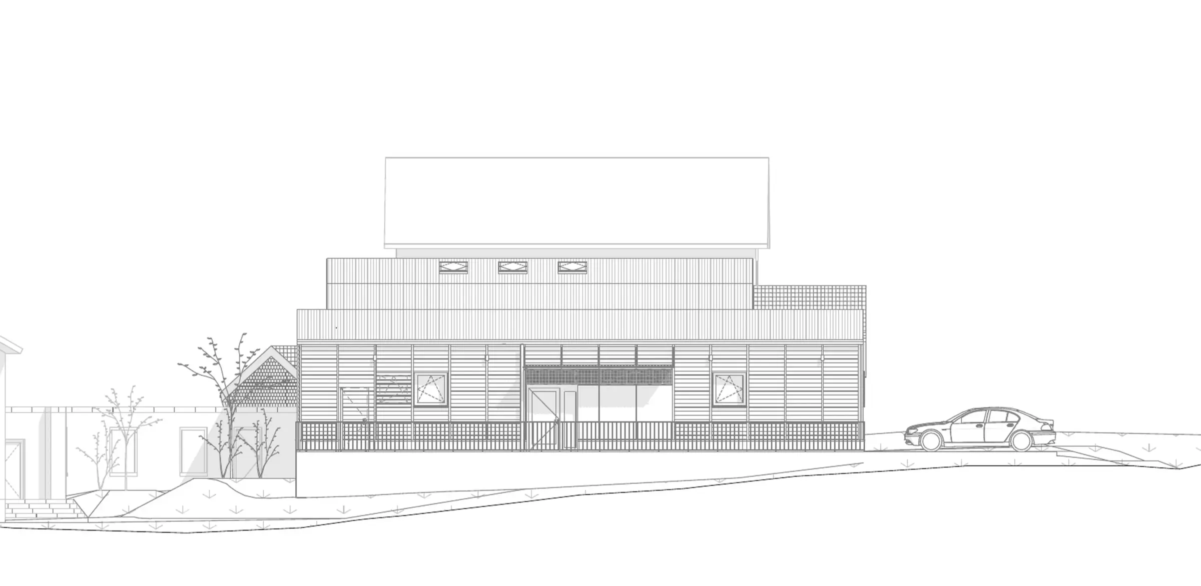 Ansicht von Norden zeigt einen langgestreckten Baukörper mit Lattenfassade und einem hoch aufragenden, rechteckigen Turmaufbau.