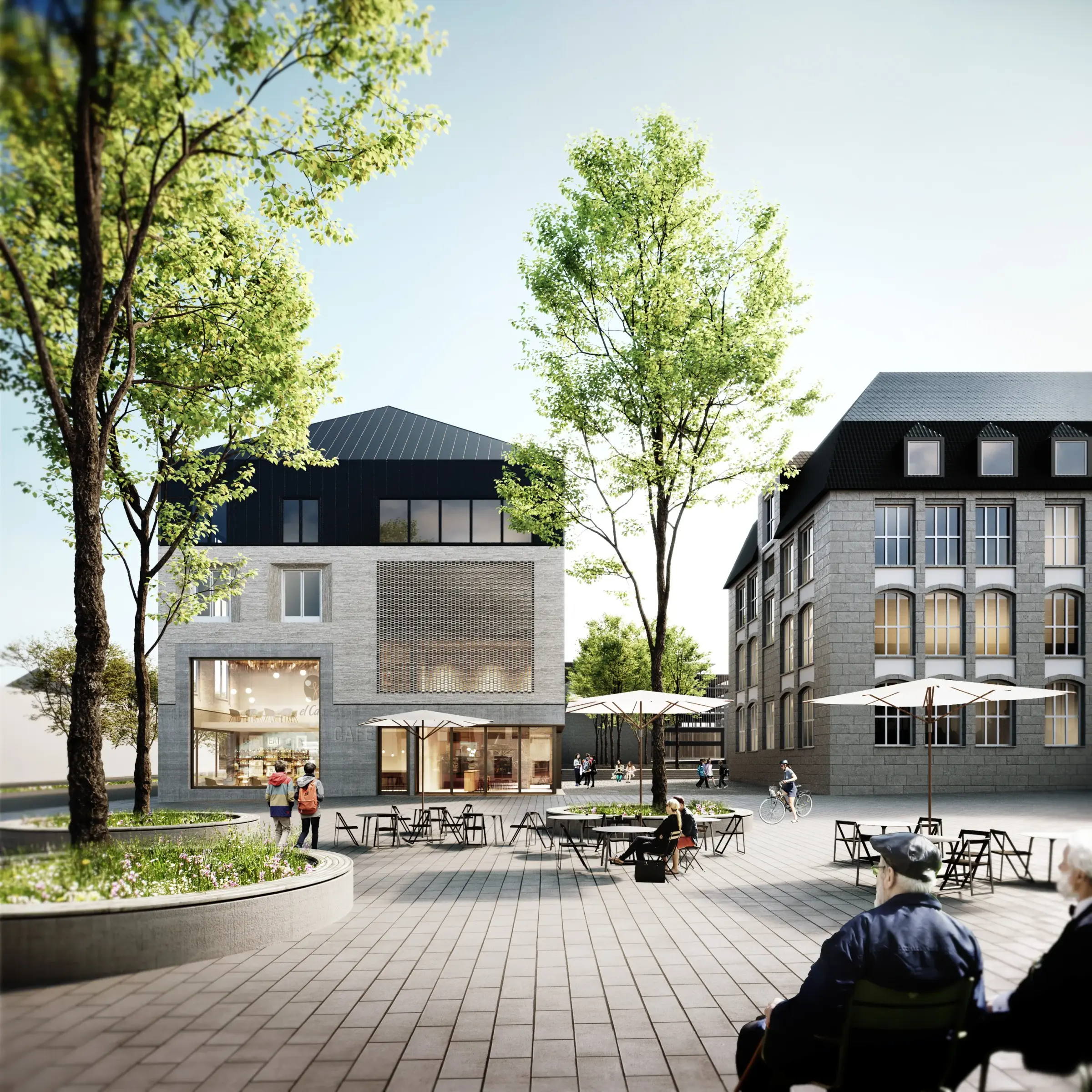Platz zwischen einem Gebäude mit Natursteinfassade und dunklem Dachaufbau und einem historischen Ziegelbau